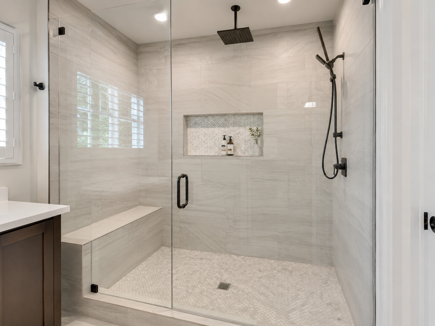Beautiful new walk-in tile shower after Bell & Hammer remodel