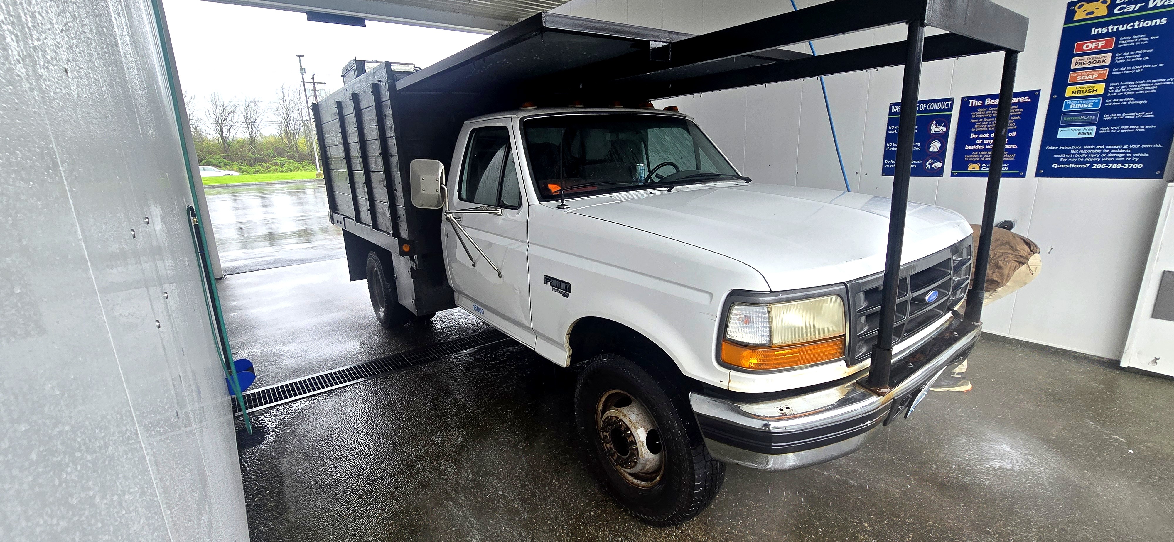 Ford dump truck front view at car wash