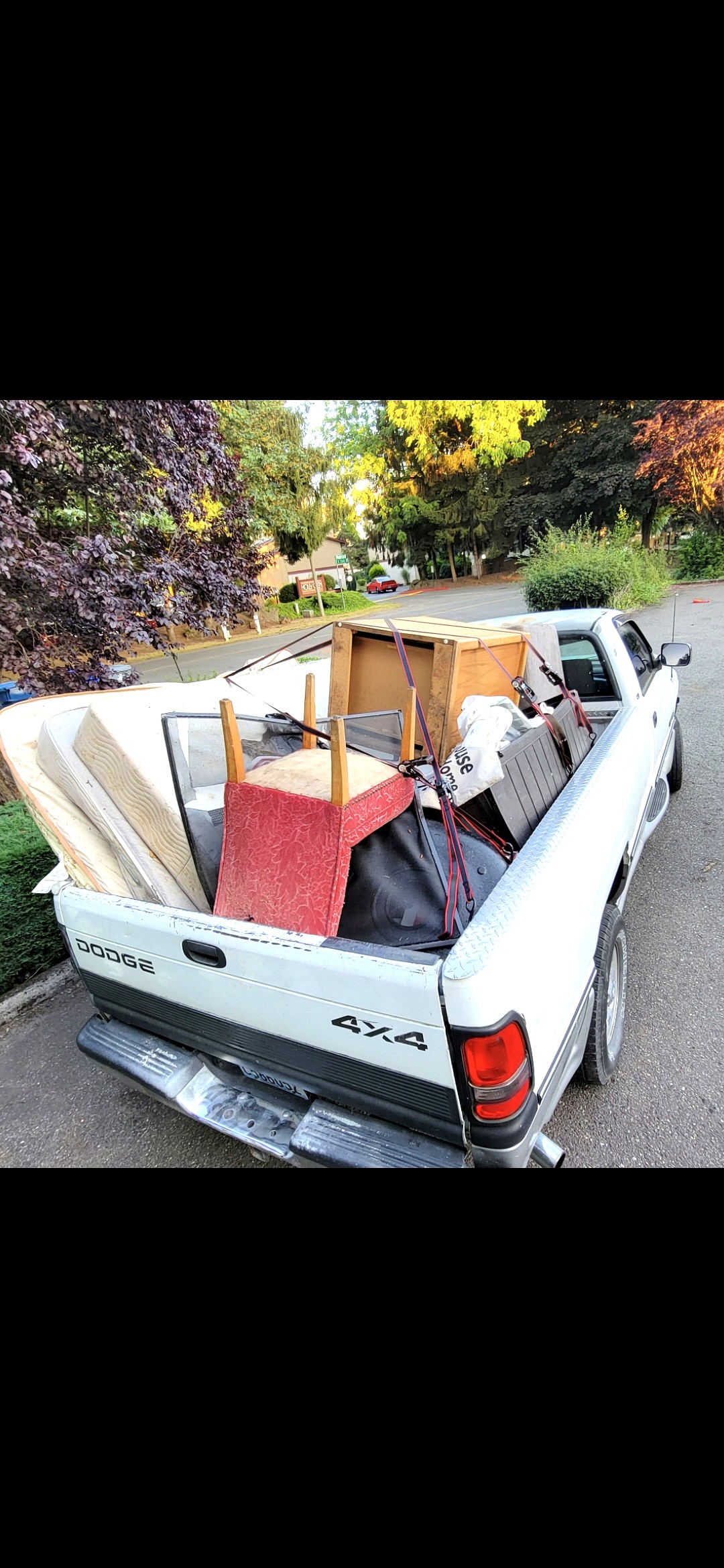 Pickup truck fully loaded with junk for hauling