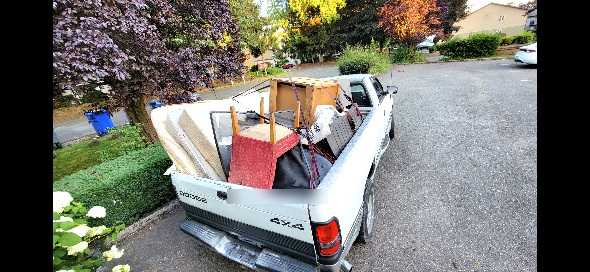 Loaded truck ready for haul on residential street