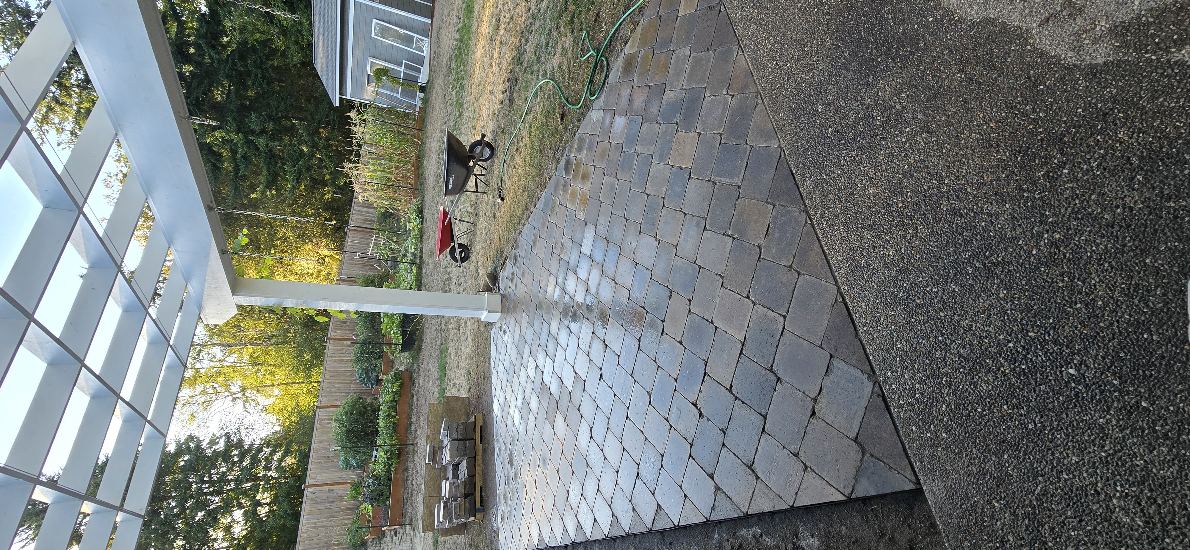 Finished paver patio and walkway with gravel border